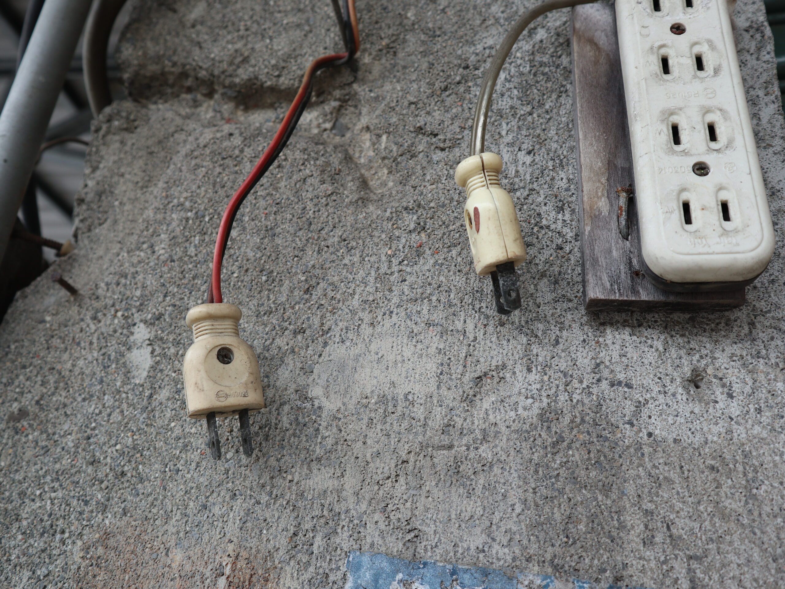 abandoned plug socket and outlets on the concrete wall design fo